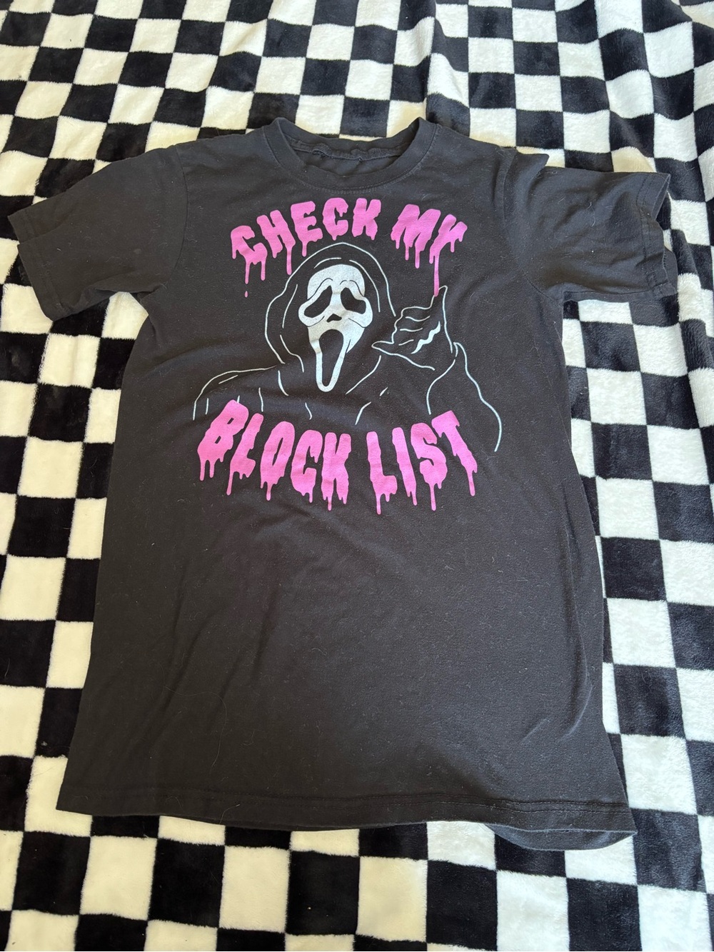 Size small ghost face tshirt (small dot stain)